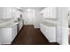 Modern kitchen with white cabinets, stainless steel appliances, and ample counter space at 745 Erin Brook Ct, York, SC 29745