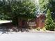 Welcoming brick Colony Square sign surrounded by mature trees and lush landscaping at 833 21St Ne Ave # 833, Hickory, NC 28301