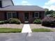 Charming brick home featuring a well-manicured front yard and inviting entryway at 833 21St Ne Ave # 833, Hickory, NC 28301