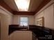 Bright kitchen with white cabinets, granite countertops, and modern appliances at 833 21St Ne Ave # 833, Hickory, NC 28301
