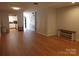 Open floorplan living room with hardwood floors and access to kitchen at 833 21St Ne Ave # 833, Hickory, NC 28301