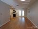 Bright living room featuring a fireplace and french doors at 833 21St Ne Ave # 833, Hickory, NC 28301