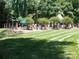 Community pool with trees, fence, and lawn at 833 21St Ne Ave # 833, Hickory, NC 28301
