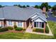 Aerial view of the brick home, showing landscaping and neighborhood streets at 8538 Highland Glen Dr, Charlotte, NC 28269
