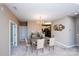 Cozy dining room featuring a stylish chandelier, a dining table set for six, and easy access to the kitchen at 8538 Highland Glen Dr, Charlotte, NC 28269