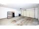 The garage is empty and has an automatic overhead door at 8538 Highland Glen Dr, Charlotte, NC 28269