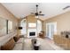 Staged living room with vaulted ceilings, fireplace, and neutral decor at 8538 Highland Glen Dr, Charlotte, NC 28269