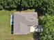 Aerial view of home with well-maintained lawn, patio, and driveway at 1008 Millbridge Pkwy, Waxhaw, NC 28173