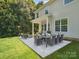 Beautiful outdoor patio with dining and seating area, perfect for entertaining and relaxing at 1008 Millbridge Pkwy, Waxhaw, NC 28173