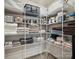 Organized closet with wire shelving, holding folded towels and organized containers at 1008 Millbridge Pkwy, Waxhaw, NC 28173