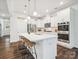 Spacious kitchen with large island, modern appliances, and plenty of cabinet space at 1008 Millbridge Pkwy, Waxhaw, NC 28173