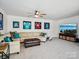 Relaxing living room featuring comfortable seating, TV, and decorative sports memorabilia at 1008 Millbridge Pkwy, Waxhaw, NC 28173