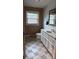 Bright bathroom featuring ceramic floors, a large vanity, and modern fixtures at 1010 Sprucewood St, Kannapolis, NC 28081