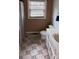 Cozy bathroom featuring tiled flooring, a toilet, and a single sink vanity at 1010 Sprucewood St, Kannapolis, NC 28081
