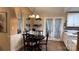 Cozy dining area featuring wood floors, contemporary lighting, and bright paint at 1010 Sprucewood St, Kannapolis, NC 28081