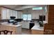 Spacious kitchen featuring updated appliances, bright cabinetry, and ample counter space at 1010 Sprucewood St, Kannapolis, NC 28081