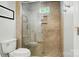 Modern bathroom boasts sleek glass shower, tiled walls, and stylish fixtures at 1042 Heather Glen Dr, Matthews, NC 28104