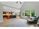 Open concept living room features access to a kitchen and dining area, all filled with natural light at 1042 Heather Glen Dr, Matthews, NC 28104