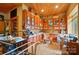 Well-equipped workshop with wood-clad ceilings, ample storage, and natural light at 1042 Heather Glen Dr, Matthews, NC 28104