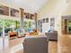 Spacious living room featuring high ceilings, ample natural light, and modern furnishings at 106 Boyter Ct, Cramerton, NC 28032