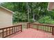 Relaxing wooden deck providing a private outdoor retreat with views of the serene backyard landscape at 10606 Danesway Ln, Cornelius, NC 28031
