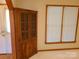 Cozy bedroom with a built-in cabinet and a large window offering plenty of natural light at 110 Kimberly Ln, Kings Mountain, NC 28086