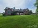 Charming single-Gathering home with a well-manicured front lawn, dormer windows, and a cozy front porch at 110 Kimberly Ln, Kings Mountain, NC 28086