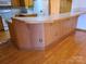 Eat-in kitchen featuring a wooden bar area, tile floors, and modern white appliances at 110 Kimberly Ln, Kings Mountain, NC 28086