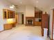 Spacious living room with a fireplace, built-in shelves, and bright lighting at 110 Kimberly Ln, Kings Mountain, NC 28086