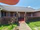 Brick patio featuring brick retaining wall, open access, and sliding glass doors to the interior at 110 Kimberly Ln, Kings Mountain, NC 28086