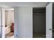 Bedroom view showing an open closet space and a bathroom at 1150 Wyatt Grove Church Rd, Gold Hill, NC 28071
