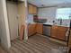 Kitchen featuring wood cabinets, stainless steel appliances, and marble backsplash at 1150 Wyatt Grove Church Rd, Gold Hill, NC 28071