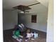 Living room featuring vinyl floors, a ceiling fan, and natural light at 1150 Wyatt Grove Church Rd, Gold Hill, NC 28071