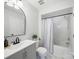 Bathroom featuring a modern vanity, shower, and attractive finishes at 12320 Verdant Ct, Charlotte, NC 28273