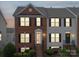 Charming townhome boasts a classic brick facade and inviting entryway at 12320 Verdant Ct, Charlotte, NC 28273