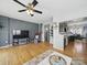 Open-concept living room with hardwood floors and modern finishes at 12320 Verdant Ct, Charlotte, NC 28273