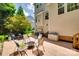 Spacious patio with outdoor seating and a fire pit, perfect for entertaining and relaxation at 1241 Brough Hall Dr, Waxhaw, NC 28173