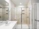 Contemporary bathroom featuring a glass-enclosed shower and elegant tile work at 125 Cedar Knoll Cir, Pineville, NC 28134