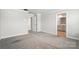 Spacious bedroom with neutral colors and plush carpeting throughout at 125 Cedar Knoll Cir, Pineville, NC 28134