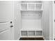 Mudroom featuring built-in bench, storage cubbies, and coat hooks at 125 Cedar Knoll Cir, Pineville, NC 28134