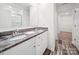 Modern bathroom with double vanity, granite countertops, and a glass-enclosed shower creates a spa-like experience at 125 Fosters Glen Pl, Mooresville, NC 28115