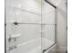 Modern bathroom features a shower with sliding glass doors and chrome hardware at 125 Fosters Glen Pl, Mooresville, NC 28115