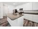 Kitchen featuring an island, stainless steel appliances, and modern cabinetry at 125 Fosters Glen Pl, Mooresville, NC 28115