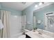 Bathroom with shower-tub, single sink, and modern fixtures at 131 Cherry Bark Dr, Mooresville, NC 28117