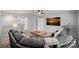 Spacious bonus room with comfortable seating, TV, and a view of the upper level at 131 Cherry Bark Dr, Mooresville, NC 28117