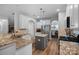 Spacious kitchen with a center island, granite countertops, and stainless steel appliances at 131 Cherry Bark Dr, Mooresville, NC 28117
