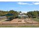 Community playground with slides, swings, and covered picnic area, perfect for Gathering fun and outdoor activities at 131 Cherry Bark Dr, Mooresville, NC 28117