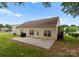 Backyard with a small patio, perfect for outdoor entertaining and relaxation at 133 Fontanelle Dr, Mooresville, NC 28115
