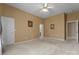 Spacious bedroom featuring neutral walls, carpet flooring, and plenty of natural light at 133 Fontanelle Dr, Mooresville, NC 28115