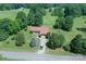 Expansive aerial view of charming brick home with long driveway and mature landscaping on a large lot at 157 Blackberry Ln, Taylorsville, NC 28681